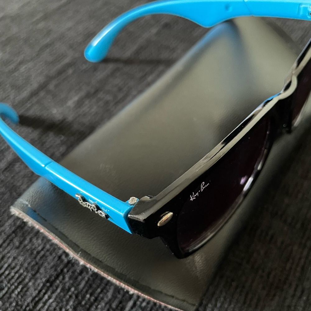 Black and Blue Ray-Ban sunglasses. Rarely used in great condition